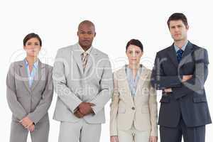 Four businesspeople standing together