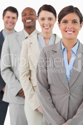 Cheerful smiling businessteam standing together