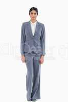 Front view of standing businesswoman