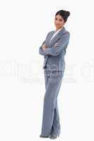 Businesswoman standing with folded arms