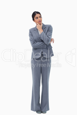 Thoughtful businesswoman looking to the side