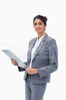 Saleswoman holding clipboard