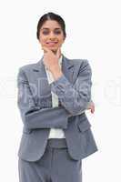 Smiling saleswoman in thinkers pose