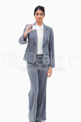 Saleswoman showing blank business card Saleswoman showing blank business card