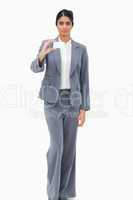 Saleswoman showing blank business card