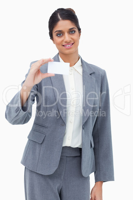 Smiling saleswoman presenting blank business card Smiling saleswoman presenting blank business card