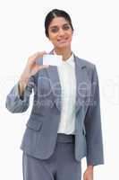 Saleswoman presenting blank business card