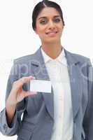 Tradeswoman showing blank business card