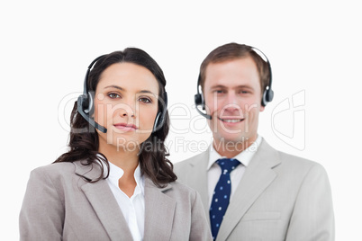 Young call center agents standing together