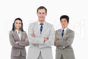 Confident young businessteam with arms folded