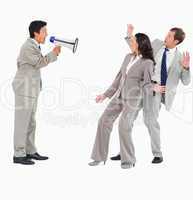 Salesman with megaphone shouting at colleagues