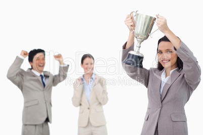 Smiling businesswoman holding cup