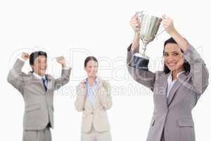 Smiling businesswoman holding cup