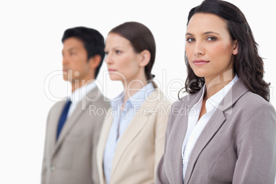 Businesswoman with colleagues next to her