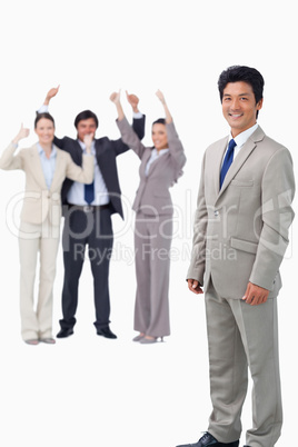 Salesman getting celebrated by his team