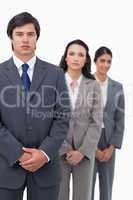 Young businesspeople standing in line