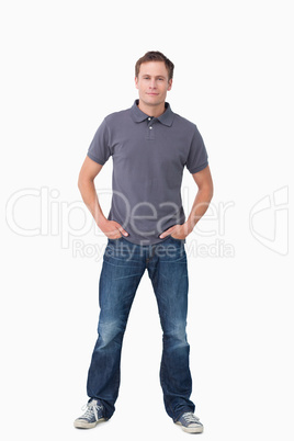 Young man with hands in his pockets