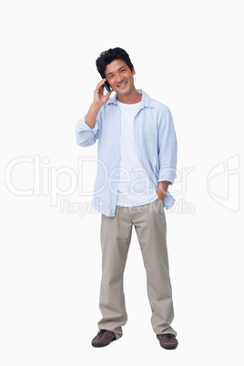 Smiling male on cellphone