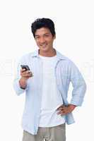 Smiling male with his cellphone