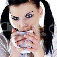 Frau beim Kaffee trinken