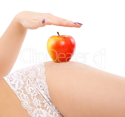 woman with red apple on hip