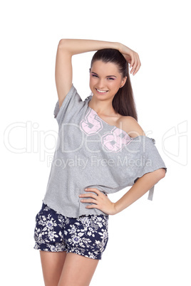 Happy young model standing and smiling