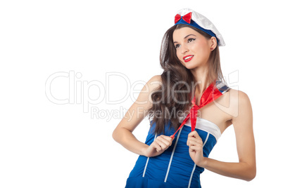 Beautiful sailor woman pulling her scarf