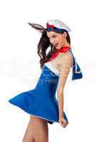 Young sexy sailor woman in wind
