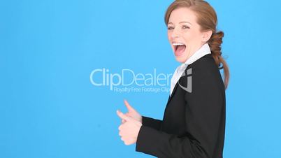 Excited Businesswoman Giving Thumbs Up
