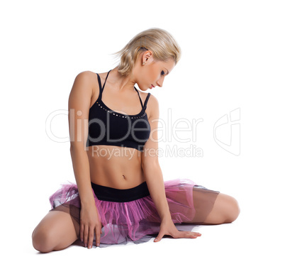 Athletic young woman posing in dance sport costume