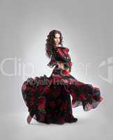 Woman dance in gypsy red and black costume