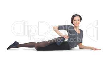 young business woman lay in yoga pose isolated