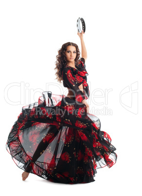 Young woman dance in gypsy with tambourine