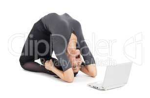 crazy business woman in yoga pose cry on laptop