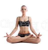 Serious young woman show lotos asana isolated