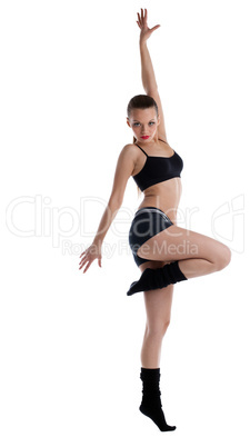 Athletic young woman posing in dance sport costume