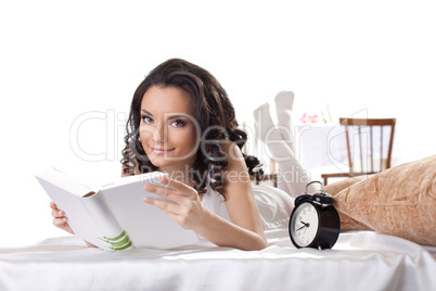 young woman read book in morning interior