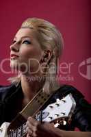 rock woman in black leather romantic with guitar