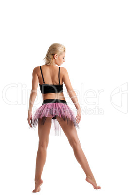 Athletic young woman posing in dance sport costume