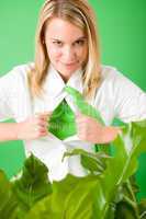 Superhero Businesswoman confident face green plant