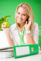 Green office woman smiling hold apple plant