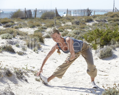 Fitness exercise on a beach