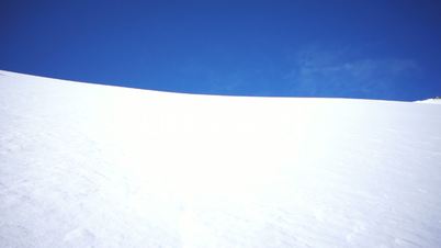 man skiing in powder snow