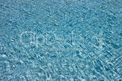 beautiful clear pool water reflecting in the sun