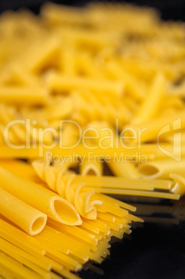 Italian pasta selection over black