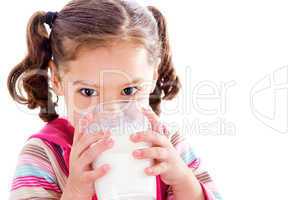 child drinking milk