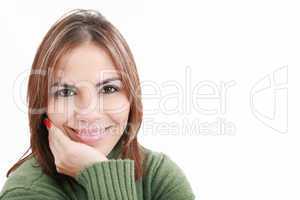 Head and shoulders shot of a young caucasian woman looking strai