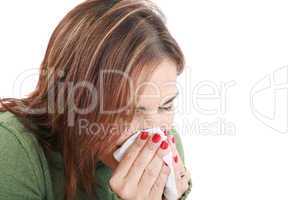 Sick woman with tissue on white
