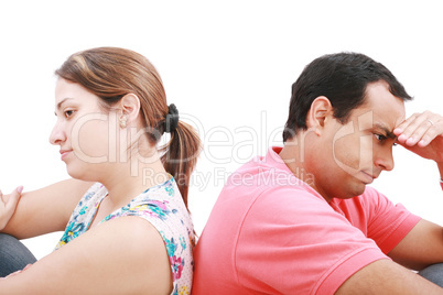 Young troubled couple isolated on white.