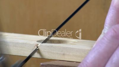 Cutting with a coping saw